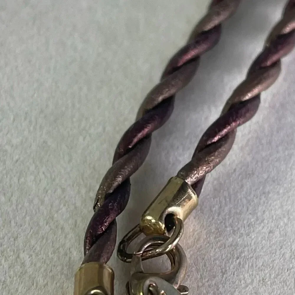 RMN glass ornate fish metallic twisted leather cord necklace.